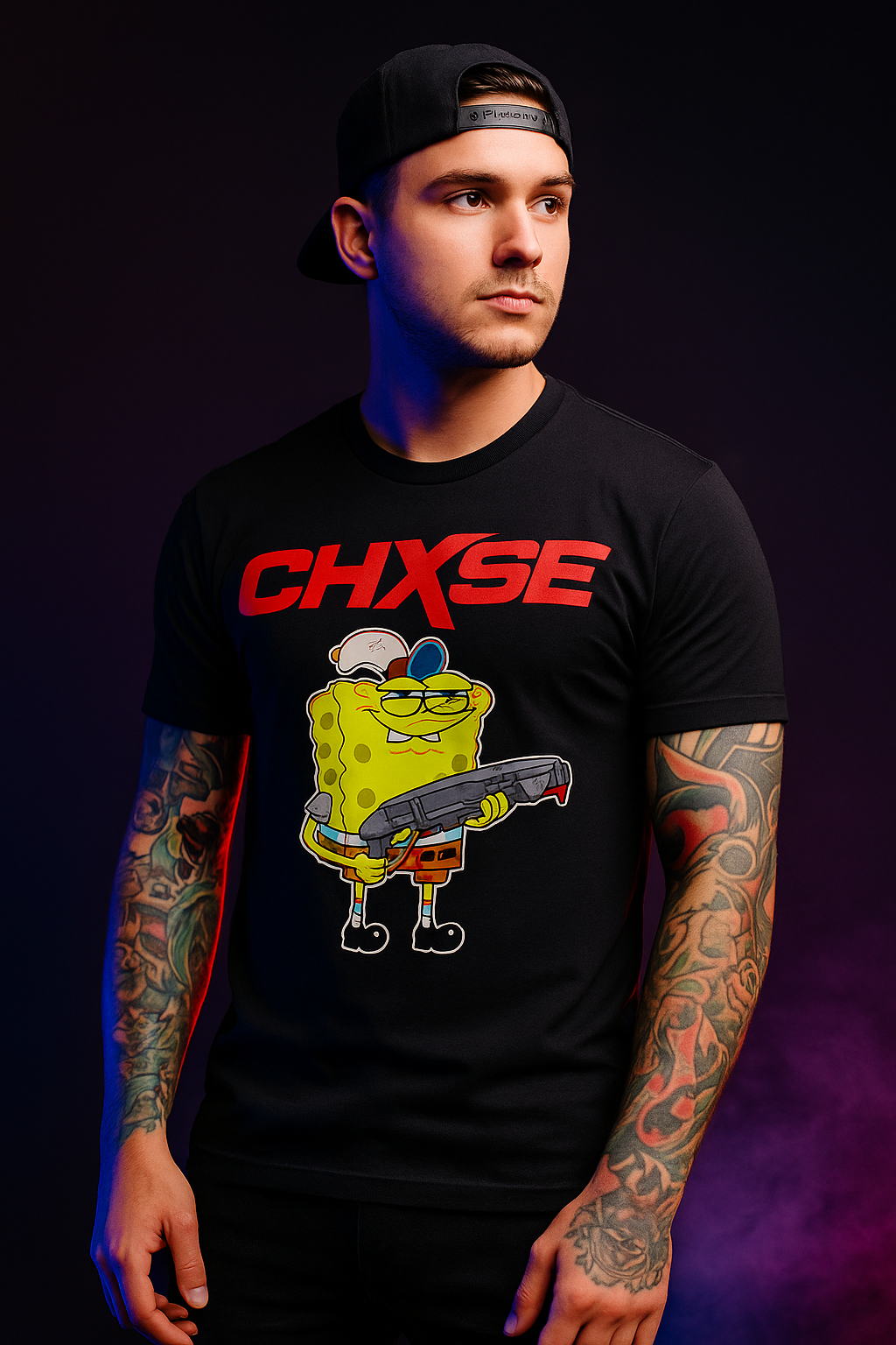 Gamer wearing black CHXSE t-shirt with red logo and SpongeBob character holding a futuristic weapon